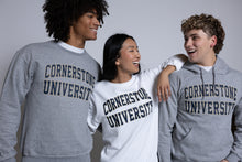 Load image into Gallery viewer, Three people wearing &#39;Cornerstone University&#39; sweatshirts against a plain background