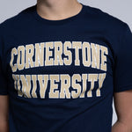 Man wearing a navy blue t-shirt with 'Cornerstone University' text on it