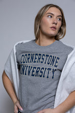 Load image into Gallery viewer, Person wearing a gray &#39;Cornerstone University&#39; t-shirt against a plain background