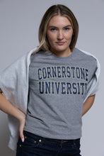 Load image into Gallery viewer, Person wearing a gray &#39;Cornerstone University&#39; t-shirt against a plain background