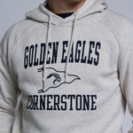 Person wearing a hoodie with 'Golden Eagles Cornerstone' text and logo.