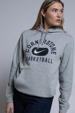 Load image into Gallery viewer, Person wearing a gray hoodie with &#39;Cornerstone Basketball&#39; and Nike logo on a plain background